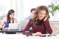 Smiling young girl talking on the phone Royalty Free Stock Photo