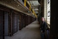 girl visiting the cell galleries of the Old Joliet Prison Royalty Free Stock Photo