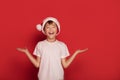 Smiling young happy boy posing in Santa Claus hat Royalty Free Stock Photo