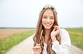 Smiling young hippie woman on cereal field Royalty Free Stock Photo