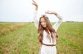 Smiling young hippie woman on cereal field Royalty Free Stock Photo