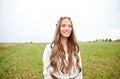 Smiling young hippie woman on cereal field Royalty Free Stock Photo