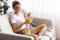 Smiling young lady holding bowl with veggies salad Royalty Free Stock Photo