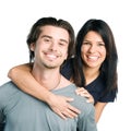 Smiling young latin couple piggyback Royalty Free Stock Photo