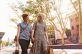 Smiling young lesbian couple shopping in the city Royalty Free Stock Photo