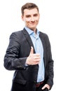 Smiling young male business executive on white background Royalty Free Stock Photo