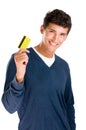 Smiling young man with credit card