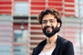 Smiling young man with glasses and beard Royalty Free Stock Photo