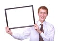 smiling young man holding a frame