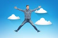 Smiling young man jumping in air Royalty Free Stock Photo