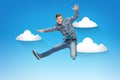 Smiling young man jumping in air Royalty Free Stock Photo