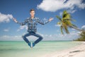 Smiling young man jumping in air Royalty Free Stock Photo