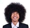 Smiling young man with long hair Royalty Free Stock Photo