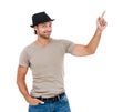 Smiling young man pointing copy space Royalty Free Stock Photo