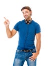Smiling young man pointing copy space Royalty Free Stock Photo