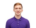 Smiling young man in purple polo t-shirt Royalty Free Stock Photo