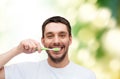 Smiling young man with toothbrush Royalty Free Stock Photo