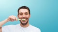 Smiling young man with toothbrush Royalty Free Stock Photo