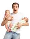 Smiling young man with two baby boys over white Royalty Free Stock Photo