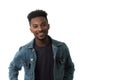 Smiling young man wearing blue jeans jacket american culture handsome male studio portrait on white background Royalty Free Stock Photo