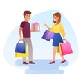 Happy young man and woman with shopping bags Royalty Free Stock Photo