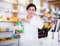 Pharmacist ready to assist in choosing at counter