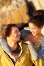 Smiling young playful couple outside Royalty Free Stock Photo