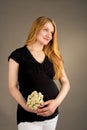 Smiling young pregnant blonde Royalty Free Stock Photo