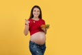 Smiling Young Pregnant Female Holding Bowl With Fresh Vegetable Salad Royalty Free Stock Photo