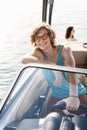 Smiling young sailor navigating in Caribbean sea