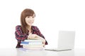 Smiling young student girl with book and laptop isolated on whit Royalty Free Stock Photo