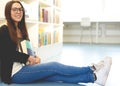 Smiling young student relaxing on campus Royalty Free Stock Photo