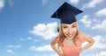 Smiling young student woman in mortarboard Royalty Free Stock Photo