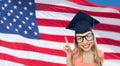 Smiling young student woman in mortarboard Royalty Free Stock Photo