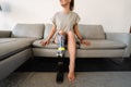 Smiling young white disabled woman with prostetic leg Royalty Free Stock Photo