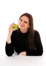 Smiling young woman with apple Royalty Free Stock Photo