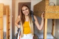 Young woman with backpack at youth hostel Royalty Free Stock Photo