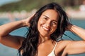 smiling young woman in bikini swimsuit on beach Royalty Free Stock Photo