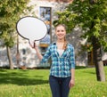 Smiling young woman with blank text bubble Royalty Free Stock Photo