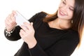 Smiling young woman Blogger Text Messaging On Mobile Phone Royalty Free Stock Photo