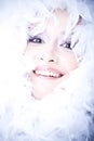 Smiling young woman with boa over her face Royalty Free Stock Photo