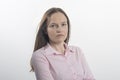 Smiling young woman businesswoman with crossed arms looking at camera against white background Royalty Free Stock Photo