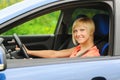 Smiling young woman in the car Royalty Free Stock Photo