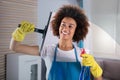 Woman Cleaning Glass Window With Squeegee Royalty Free Stock Photo