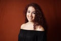 Smiling young woman with curly hair Royalty Free Stock Photo