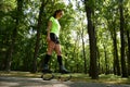 Smiling young woman doing exercises in kangoo jumps shoes Royalty Free Stock Photo