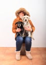 Woman with two dogs on lap Royalty Free Stock Photo