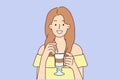 Smiling woman drinking late coffee with straw