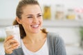 Smiling young woman drinking fresh cocktail Royalty Free Stock Photo