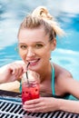 smiling young woman drinking fresh cocktail Royalty Free Stock Photo